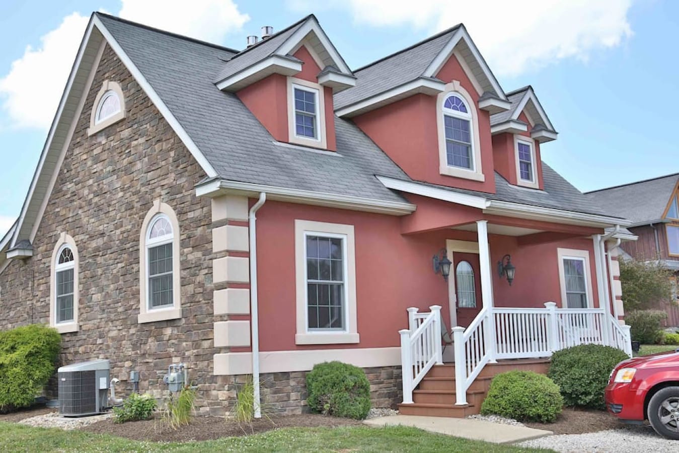 Exterior of Premier Cottage #7 with arched windows at Premier Cottages, Berlin Ohio